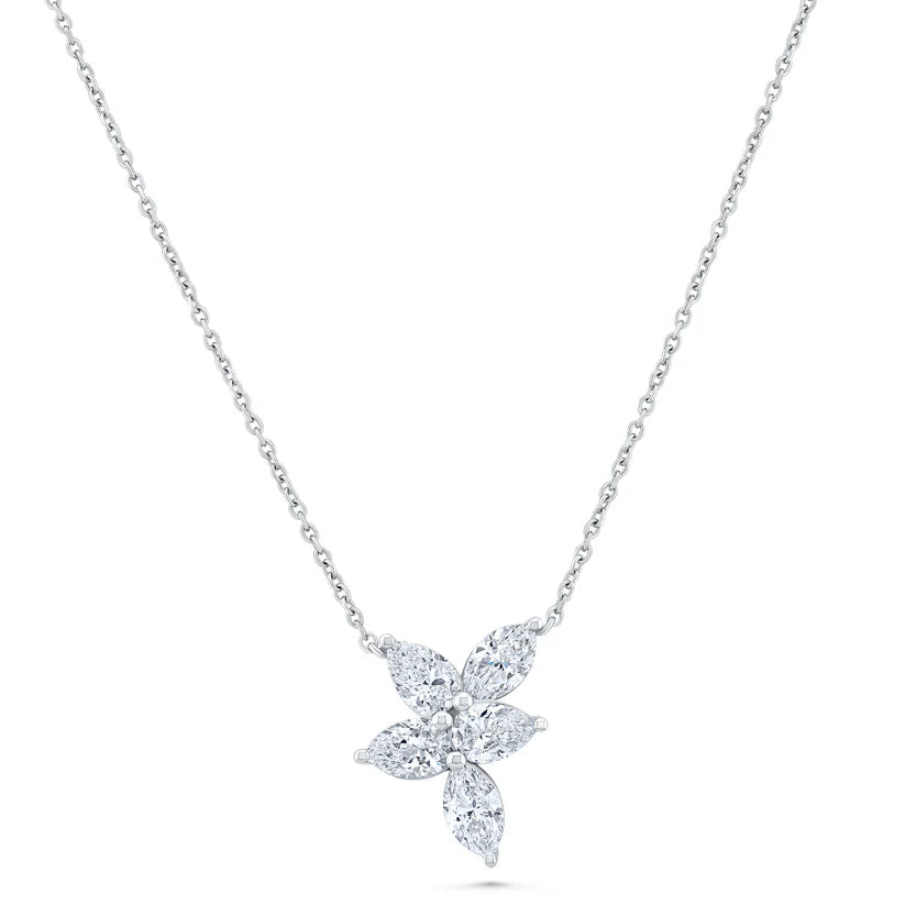 Diamond necklace with a floral pendant on a white background