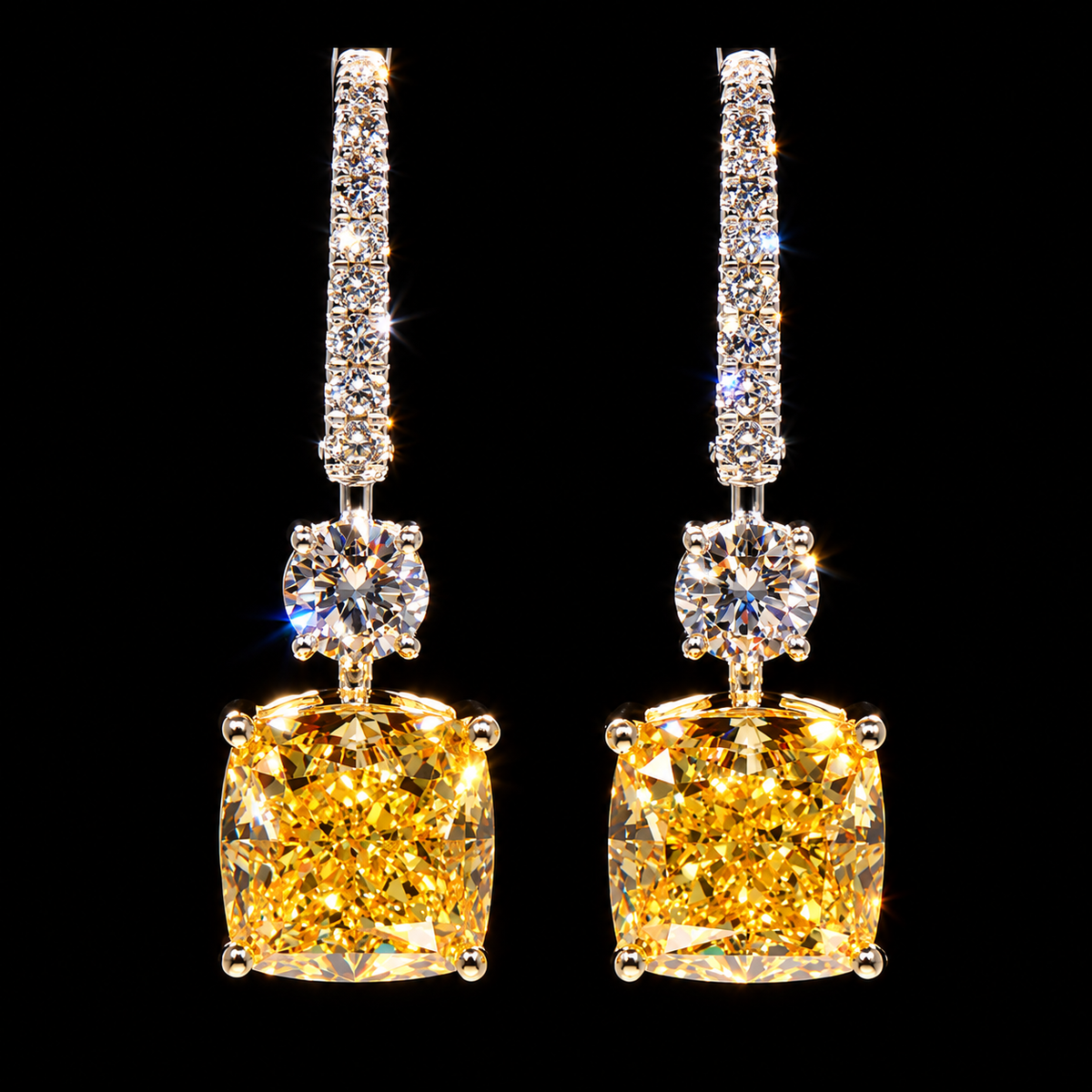 Fancy Vivid Yellow diamond drop earrings featuring two 4.00 carat yellow diamonds, approximately 1.50 carats of white diamonds, and 9.50 carats total diamond weight