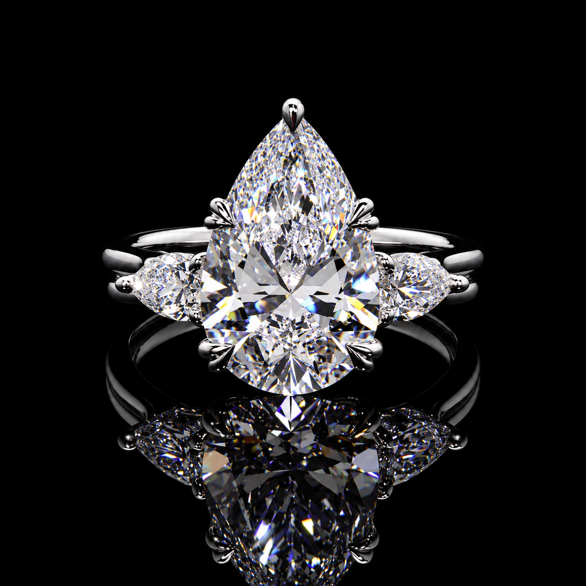 5.05 CT pear three-stone lab-grown diamond ring with matching pear side diamonds by Dan Mor Diamonds