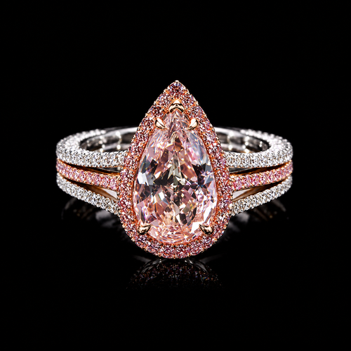 3.92 CT fancy pink halo diamond ring with 2.53 CT pear-shaped fancy pink center diamond by Dan Mor Diamonds