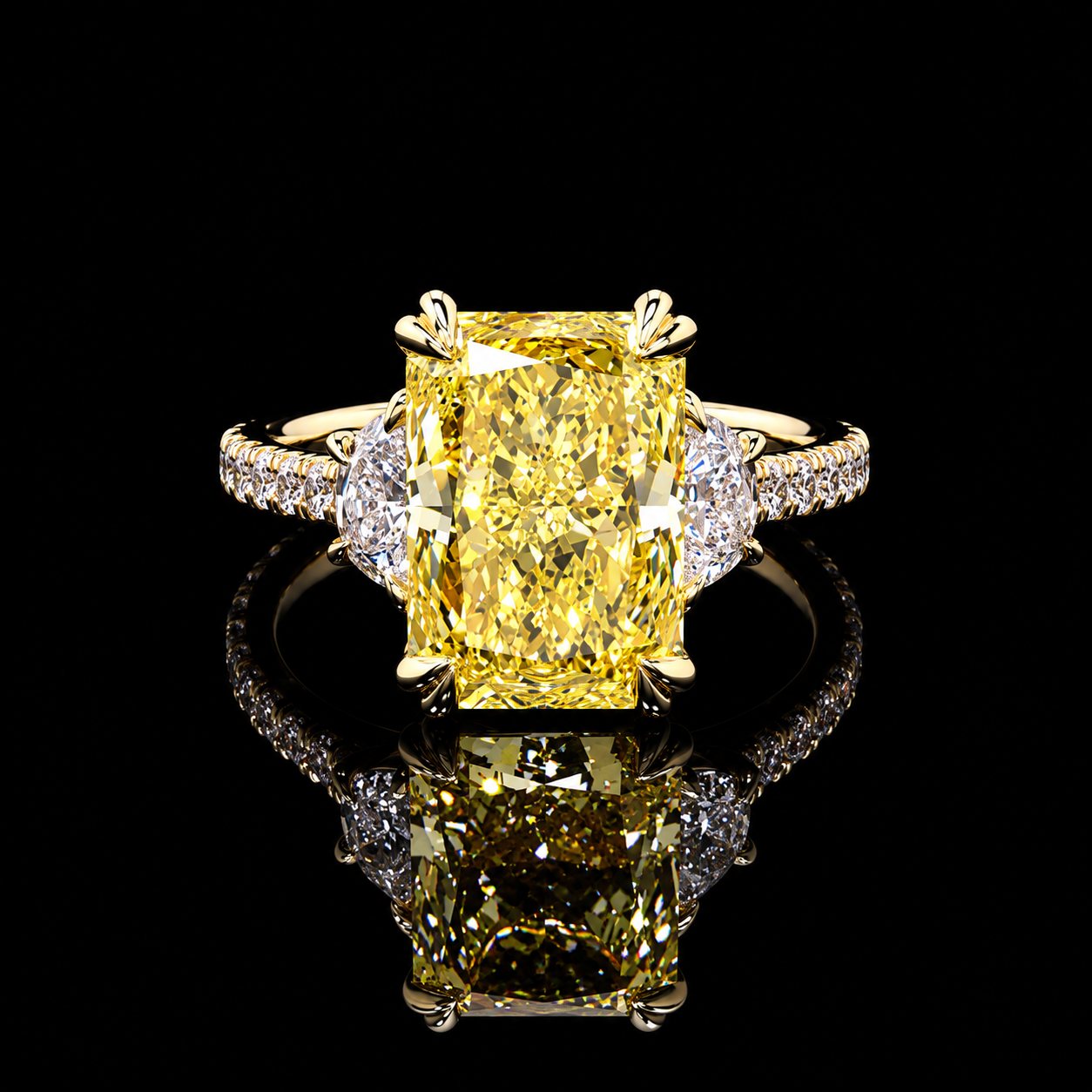6.97 CT yellow radiant three-stone diamond ring with 6.10 CT center and pear side diamonds by Dan Mor Diamonds
