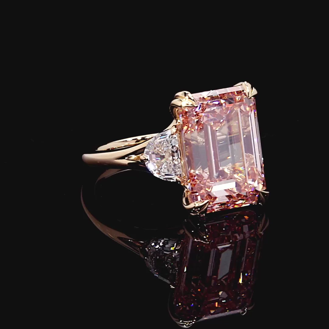 EMERALD CUT PINK DIAMOND THREE STONE RING