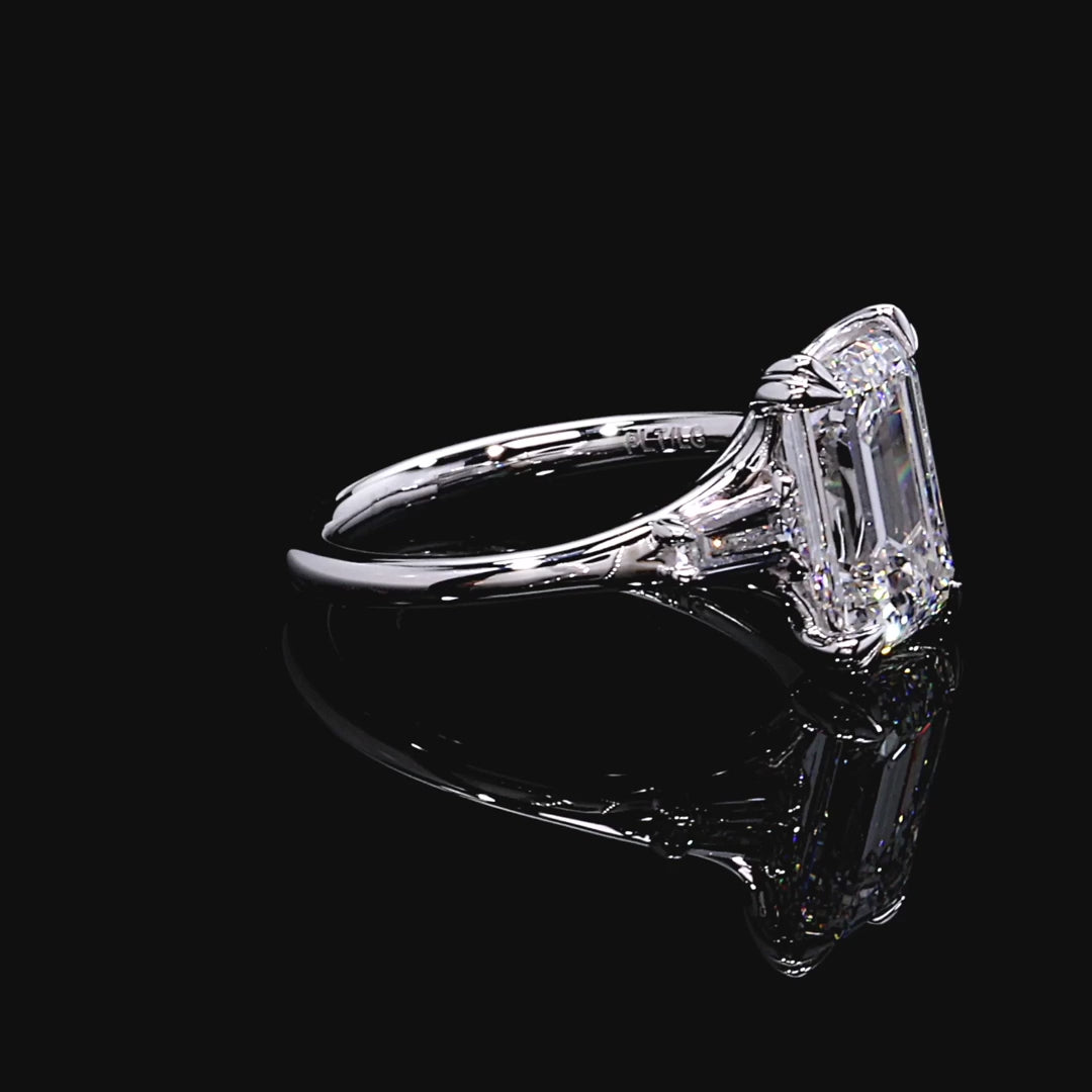 EMERALD THREE STONE DIAMOND RING