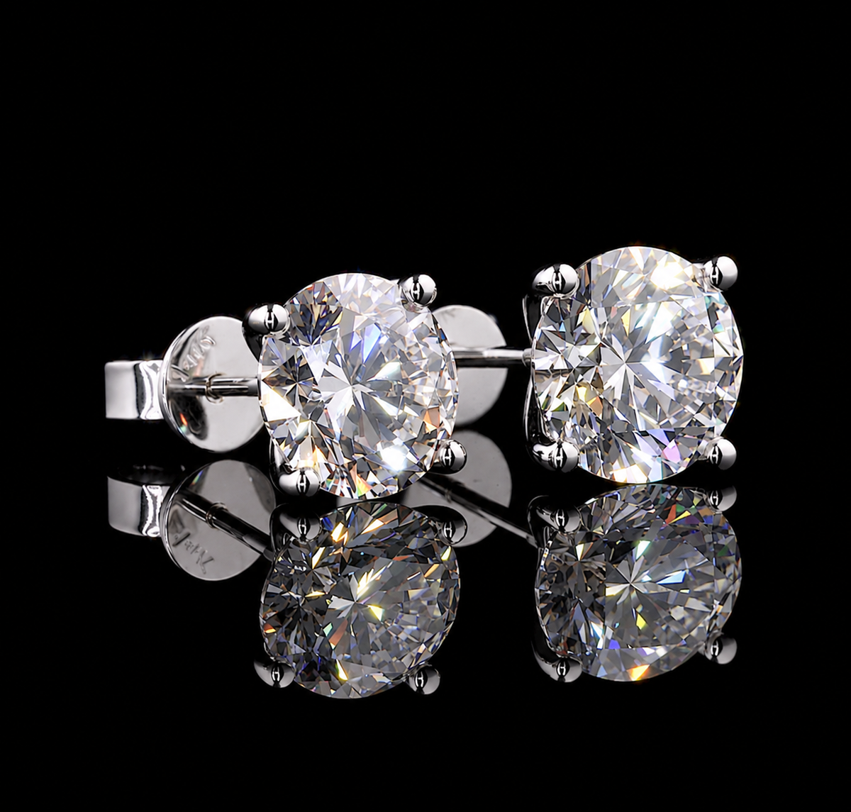 8 CT round brilliant diamond stud earrings in classic prong setting with exceptional sparkle