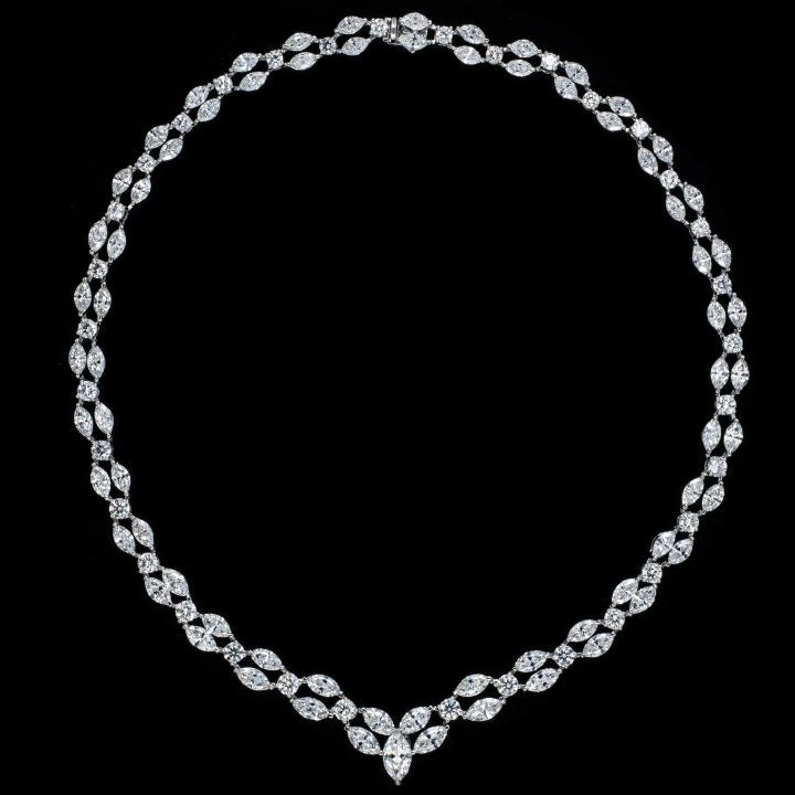 total 30.78 carat marquise and round brilliant cut