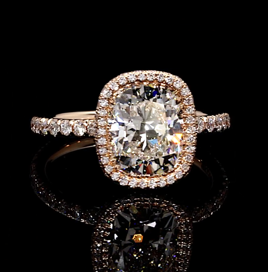 3.42 CT cushion lab-grown diamond ring with 2.70 CT E VS1 center, seamless halo and round pavé band by Dan Mor Diamonds