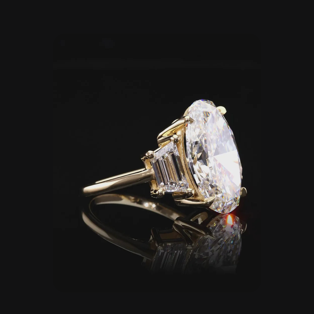 Oval Diamond Three-Stone Ring with Trapezoid Sides Dan Mor Diamonds