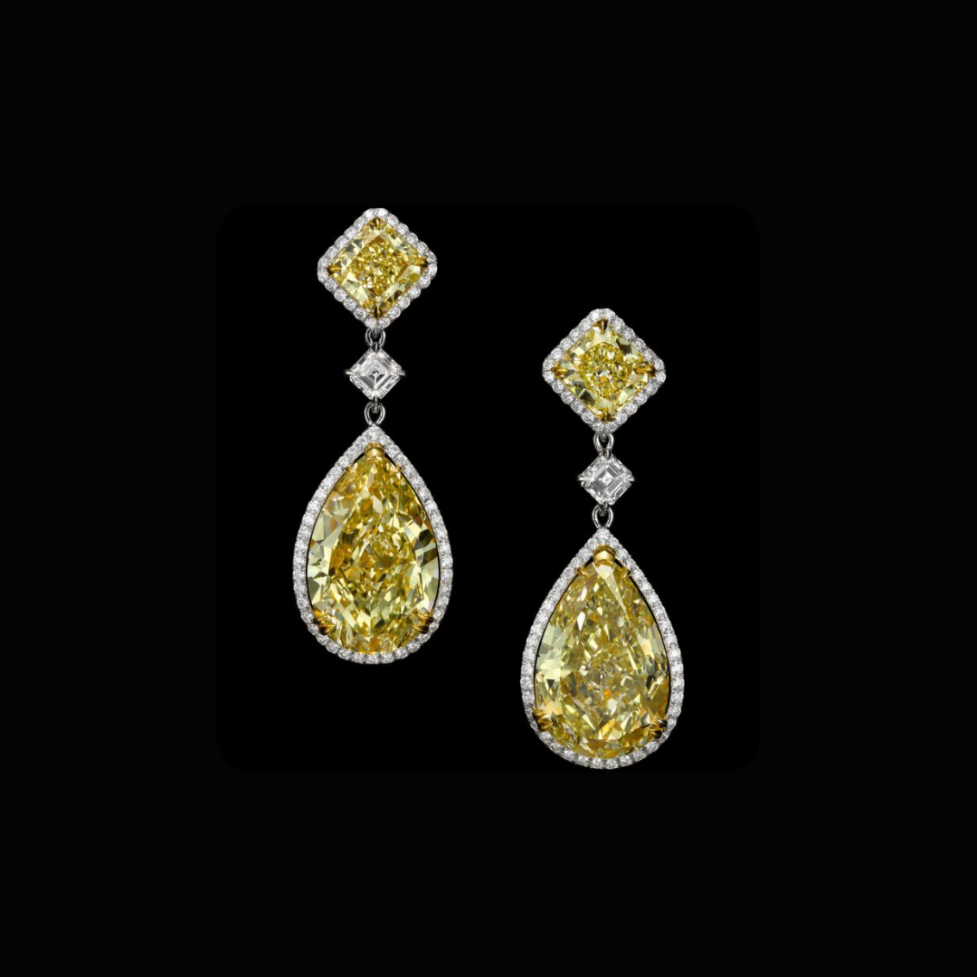 TOTAL 32 CARATS SUNLIGHT PEAR + RADIANT-CUT EARRING