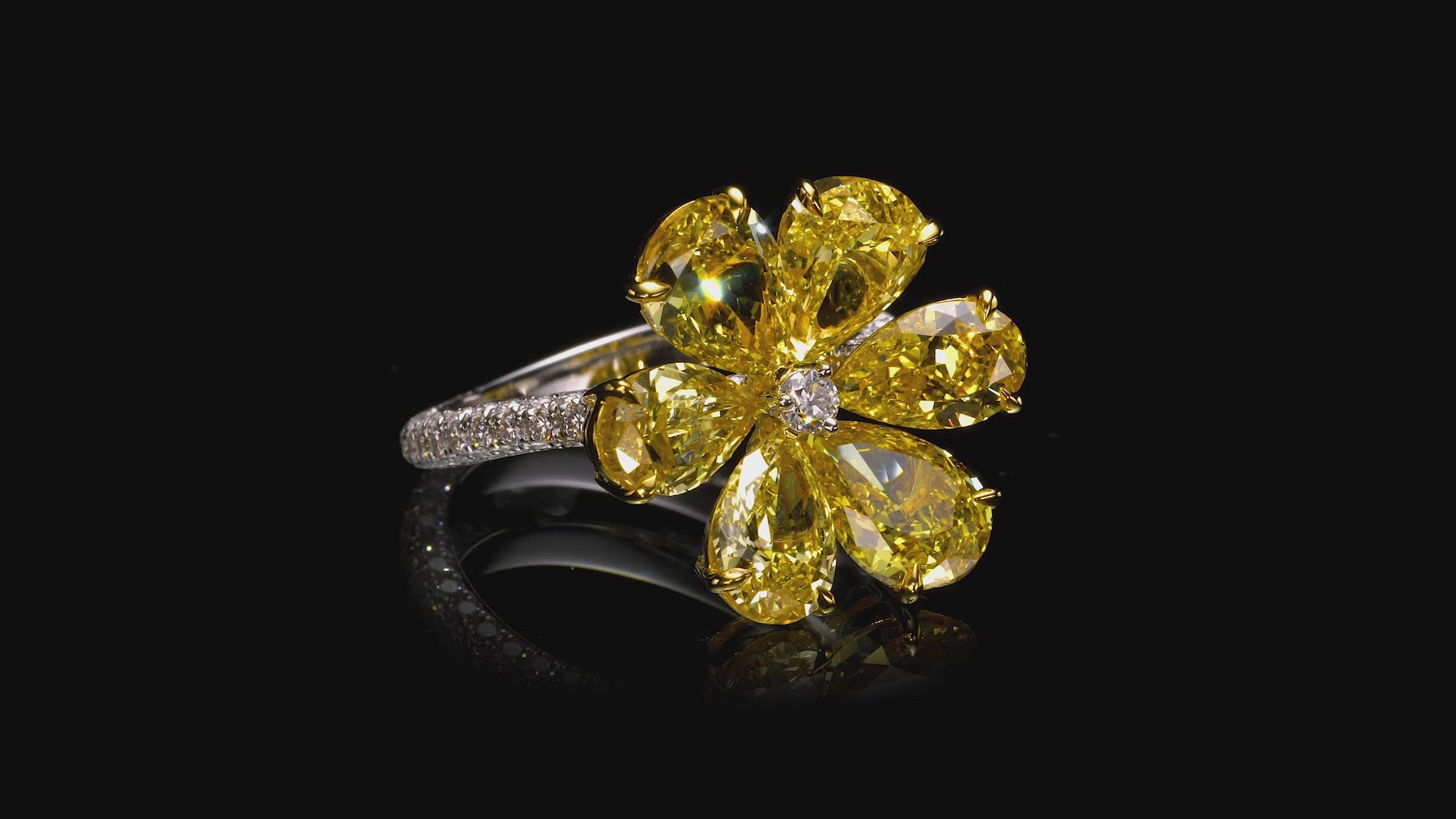 total 6.75 carat fancy vivid yellow pear diamond