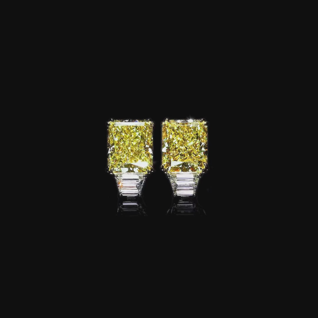 RADIANT-CUT FANCY YELLOW DIAMOND TOTALING 11.26 CARATS