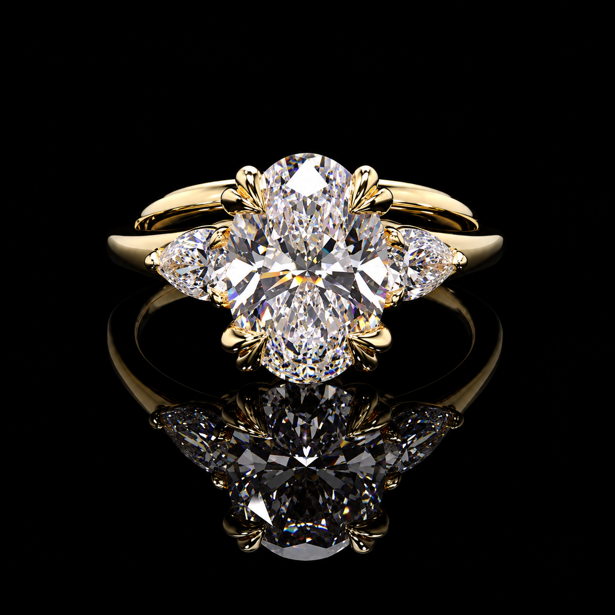 2.96 CT oval and pear three-stone diamond engagement ring with 2.52 CT oval center by Dan Mor Diamonds