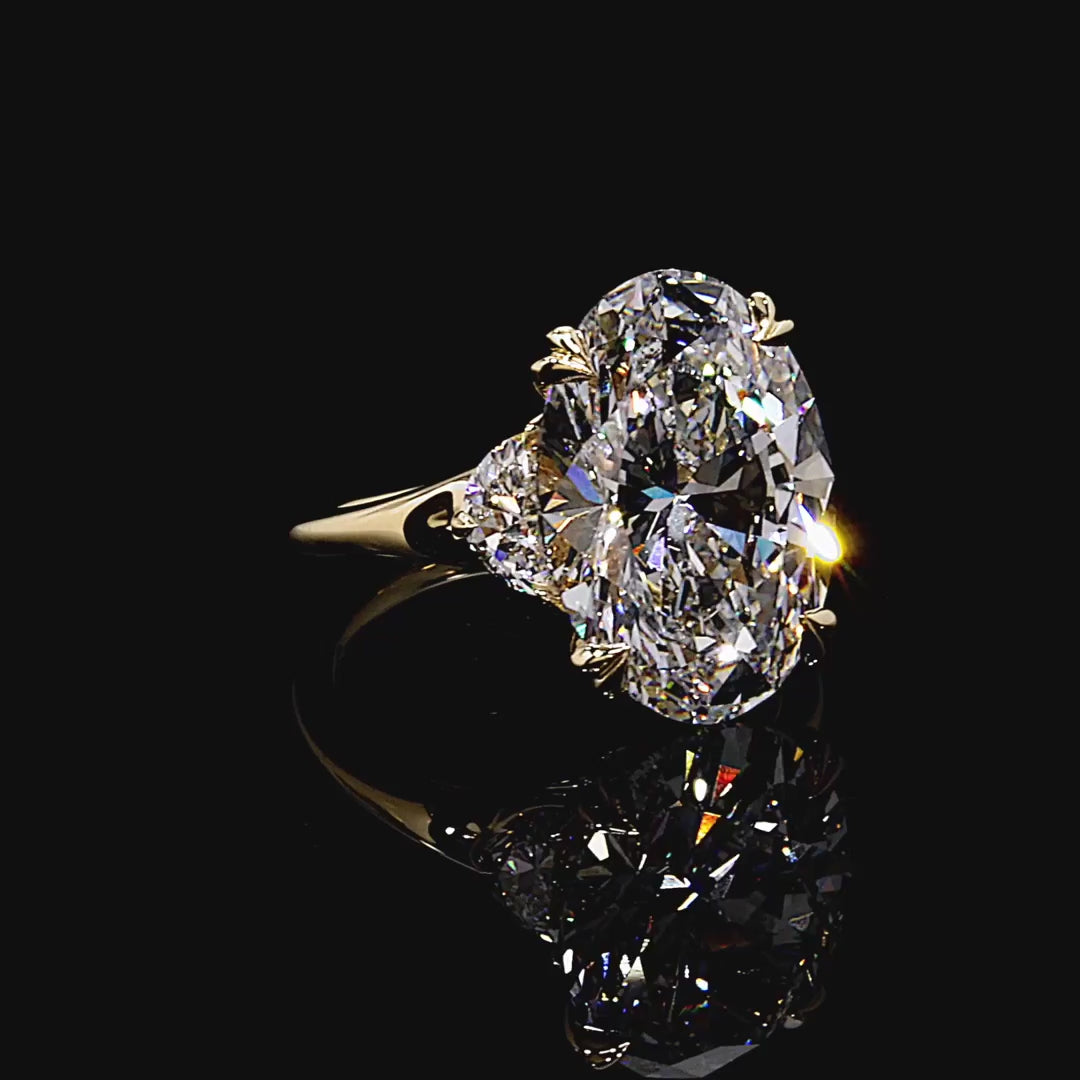OVAL THREE STONE RING
